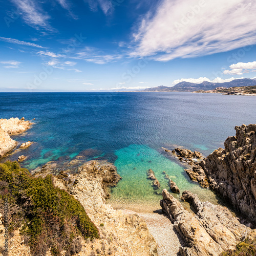 Turquoise sea and rocky coastline at Revellata in Corsica