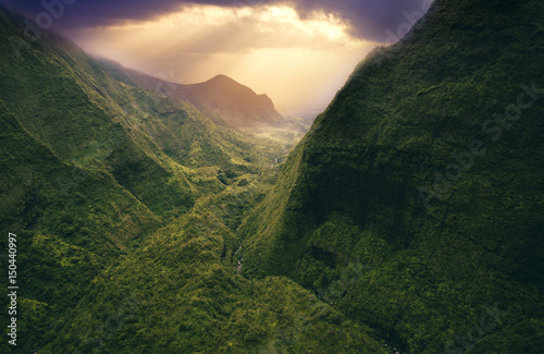 Aerial view of mountain range during sunset