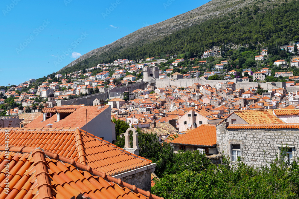 Over the rooftops towards the fortified walls of Dubrovnik's old town in Croatia