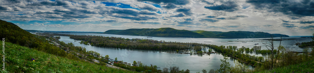 Panoramic view on Volga river and  Zhigulevskie mountains in spring near Samara city, Russia 