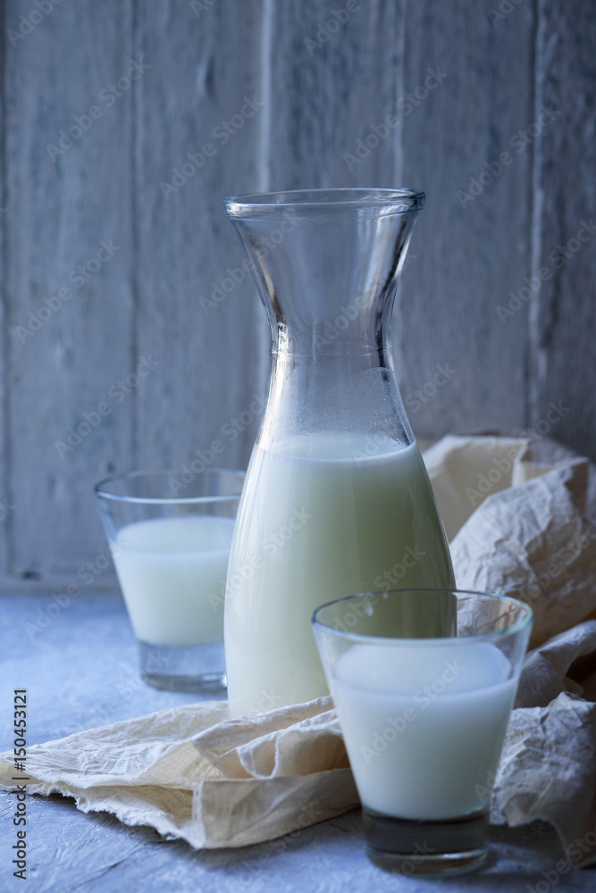 Decanter with whey and glasses Decanter with whey and glasses