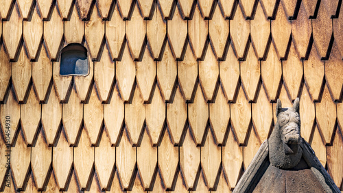 Carved wooden roof tiles, roofing elements Heddal stavkirke in Norway photo