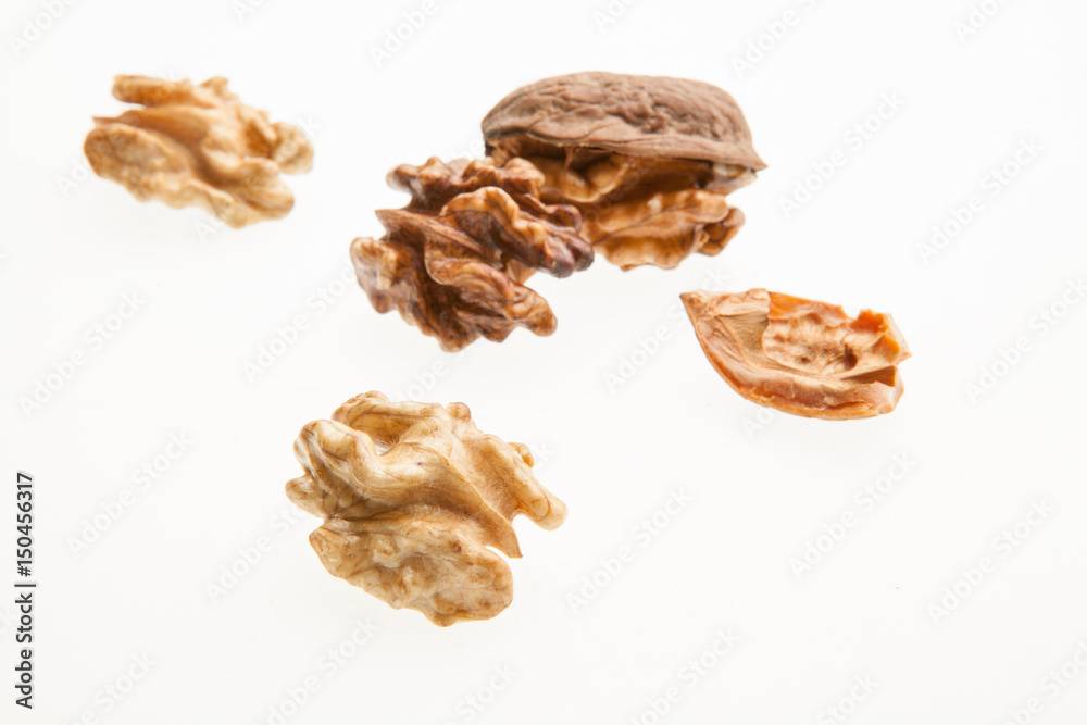 Walnuts on a white background. Walnuts on a white background.