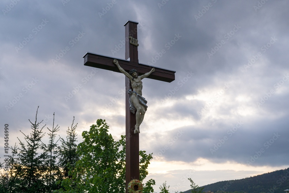 Cross with Christ during sunset. Slovakia Cross with Christ during sunset. Slovakia