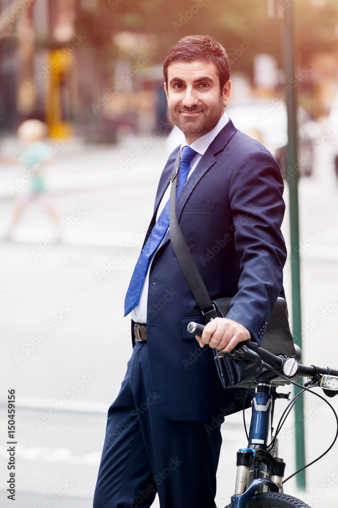 Young businessmen with a bike