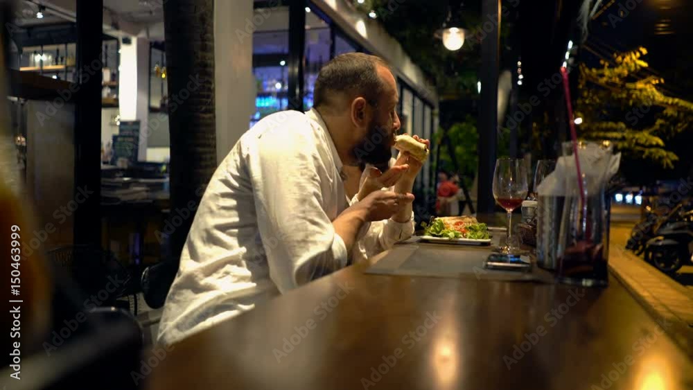 Young couple sharing food in the city, 4K

