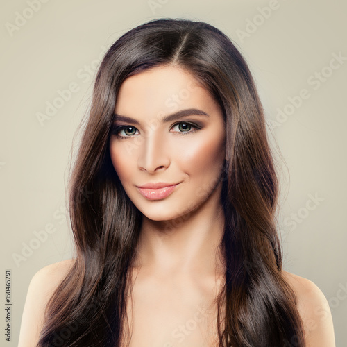 Cute Woman with Brown Hair. Perfect Hairstyle and Makeup