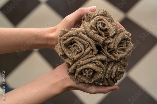 Bouquet of grey roses made of burlap photo