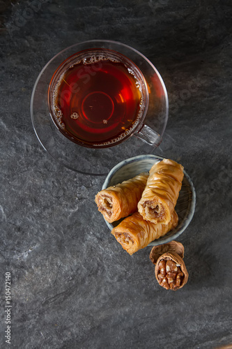 Traditional eastern arabic dessert Baklava with Turkish honey an