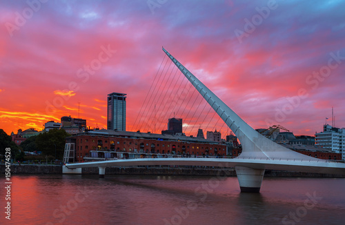 The district of Puerto Madero and theWomen's bridge in the sunset. Buenos Aires, Argentina. photo