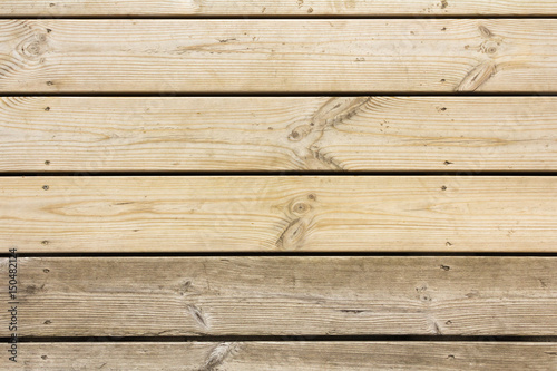 Old next to new pine boards. Abstract wooden background