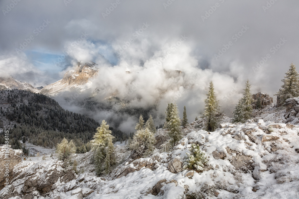 Mountains Cinque Torri (The Five Pillars), covered with snow, early autumn, Dolomites, Italy