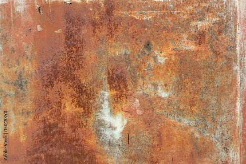 Multicolored peeling wall texture and background. Surface with brush strokes, stains.