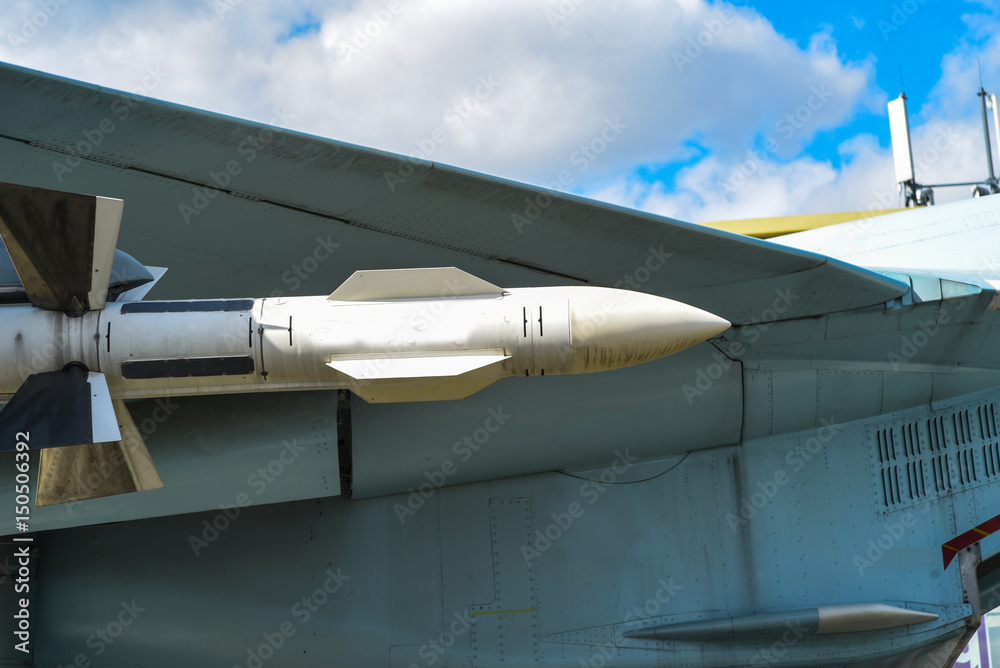 View of missile air-air suspended under the wing of Russian fighter View of missile air-air suspended under the wing of Russian fighter