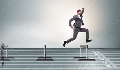 Εκτύπωση καμβά Businessman jumping over barriers in business concept
