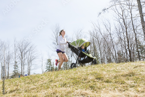 Mother doing Training, jogging with baby