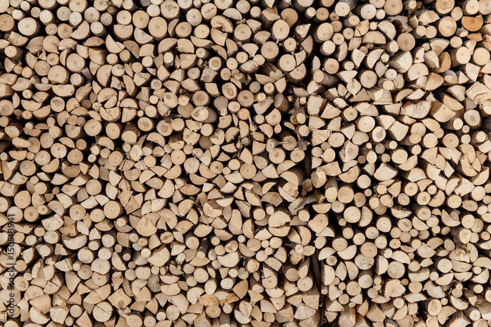 wall firewood , Background of dry chopped firewood logs in a pile wall firewood , Background of dry chopped firewood logs in a pile