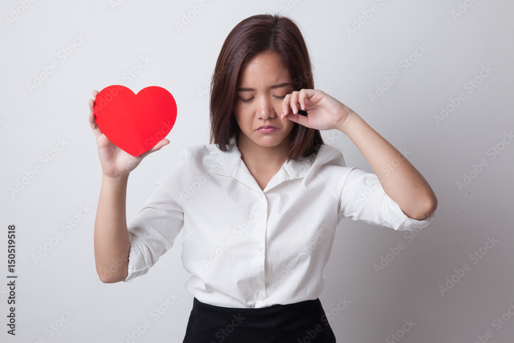 Asian woman sad and cry with red heart. Asian woman sad and cry with red heart.