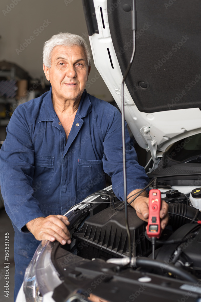 Mechanic in an automotive workshop Mechanic in an automotive workshop