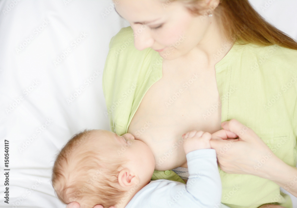 Mother breastfeeding her baby Mother breastfeeding her baby