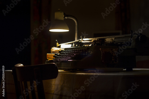 old typewriter at night with low light