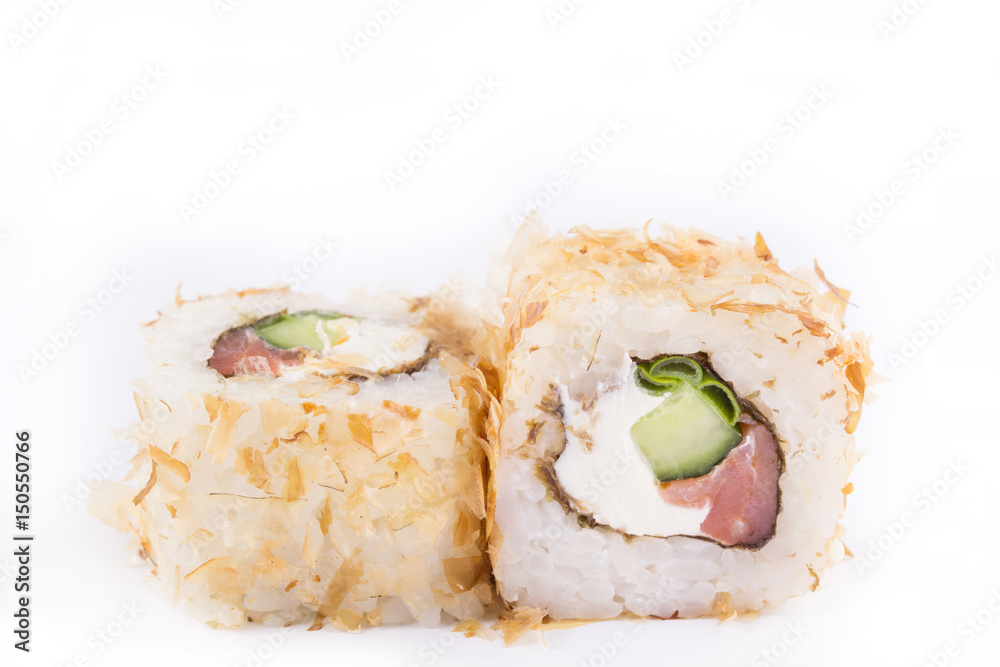 japanese Cuisine, Sushi Set: roll with shavings of tuna, smoked salmon, cream cheese, green onions, cucumber on a white background. japanese Cuisine, Sushi Set: roll with shavings of tuna, smoked salmon, cream cheese, green onions, cucumber on a white background.