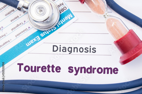 Diagnosis of Tourette syndrome. On psychiatrist or psychologist table is paper with inscription Tourette syndrome (disease) near psychiatric report, hourglass and stethoscope photo