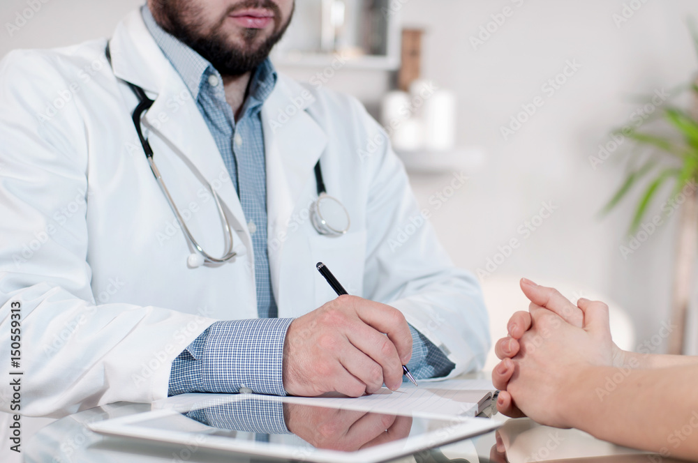 Doctor and patient are discussing something Doctor and patient are discussing something