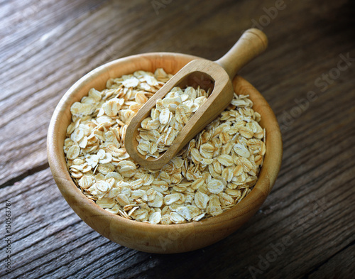Rolled oats on a wooden table