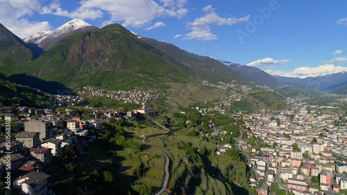 Aerial 4K - Sondrio - Valtellina (IT) - Vista aerea della città verso est - Vigneti di S. Anna e Convento di S. Lorenzo photo