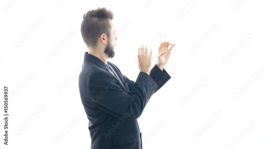 Funny bearded man in suit imitating play on wind instrument, studio isolated on white background. Funny bearded man in suit imitating play on wind instrument, studio isolated on white background.