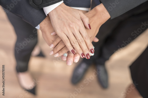  Group of business Asian people with hands together.Business concept.