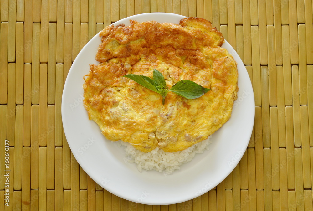 fried egg stuffed minced pork topping basil leaf on rice fried egg stuffed minced pork topping basil leaf on rice