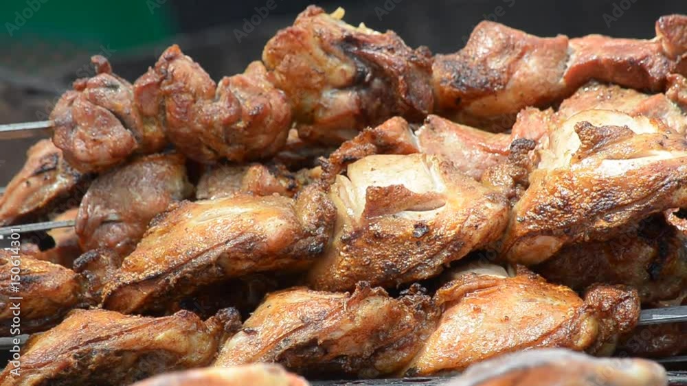 Prepared chicken roasted on the grill, street trading. Close-up. Prepared chicken roasted on the grill, street trading. Close-up.