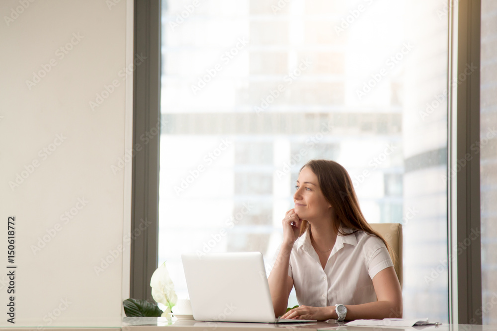 Satisfied businesswoman dreams about success at workplace. Pensive young woman imagines great achievement in business. Female entrepreneur visualizes in imagination desired positive result. Copy space Satisfied businesswoman dreams about success at workplace. Pensive young woman imagines great achievement in business. Female entrepreneur visualizes in imagination desired positive result. Copy space
