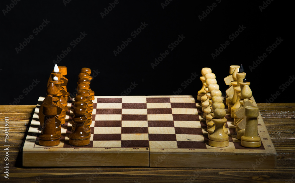 Initial chess position on a black background Initial chess position on a black background