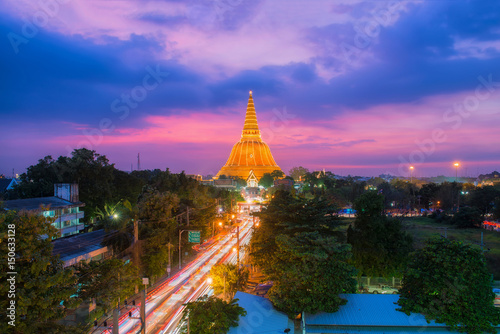 Aerial view of Large golden pagoda in Thailand at sunset, Located in the community at sunset , Phra Pathom Chedi , Nakhon Pathom , Thailand.