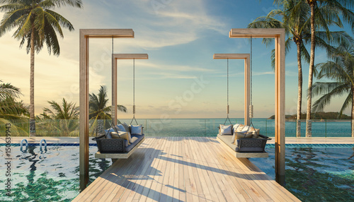 Vászonkép Beautiful Swing sofa on the Swimming pool waters outdoor beach