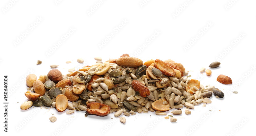 Healthy mix of salty and spicy peanuts, almonds, sunflowers, and pumpkin seeds, isolated on white background Healthy mix of salty and spicy peanuts, almonds, sunflowers, and pumpkin seeds, isolated on white background