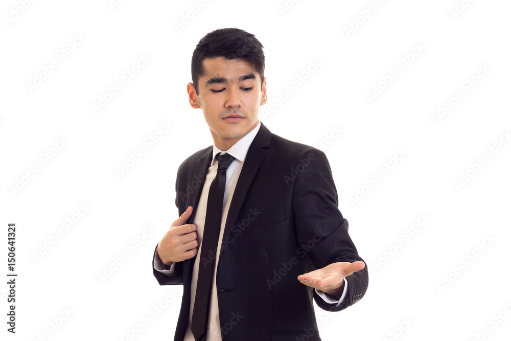 Young man in black tuxedo Young man in black tuxedo