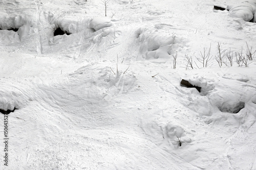 Foto Off-piste slope with tracks from ski and snowboard