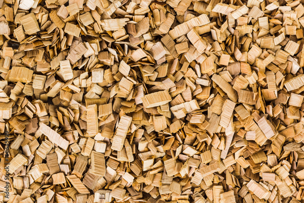 Background image of brown wood chips. Texture. Background image of brown wood chips. Texture.