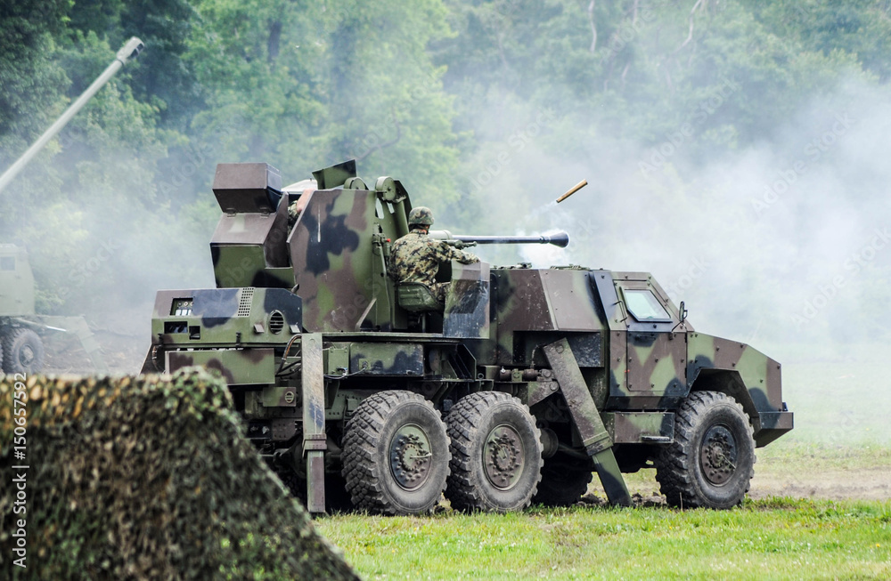 Fototapeta premium Heavy anti aircraft gun shooting