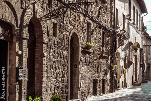Fototapeta Naklejka Na Ścianę i Meble -   View of a street of the small and famous town of Volterra, Italy.