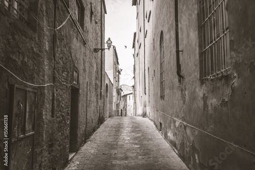 Fototapeta Naklejka Na Ścianę i Meble -   View of a street of the small and famous town of Volterra, Italy.
