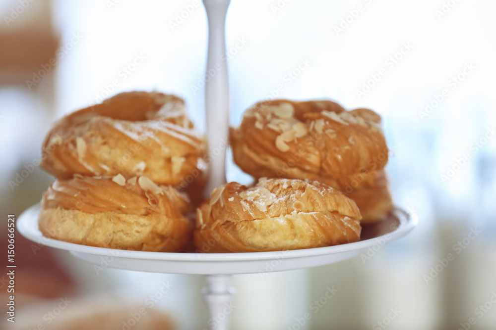 Dessert stand with delicious pastry, closeup