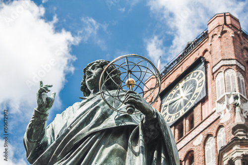 Nicolaus Copernicus (Kopernik) statue monument in Torun (Toruń) city, Poland photo