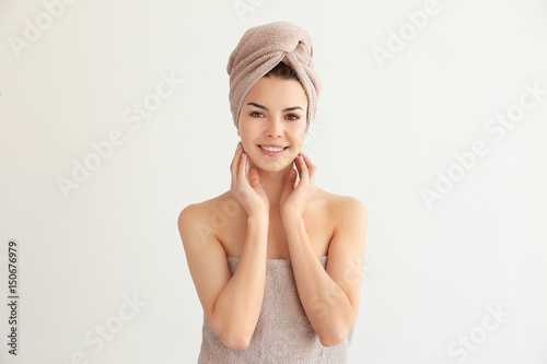 Wallpaper Mural Beautiful young woman after shower on light background Torontodigital.ca