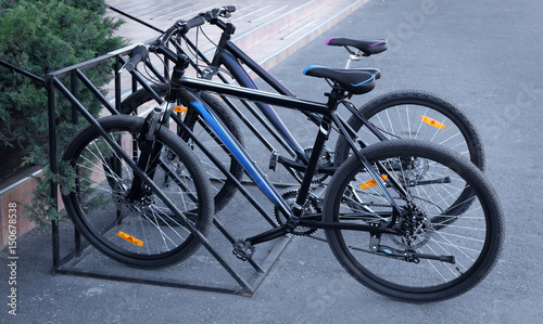 Bicycles in parking lots outdoors