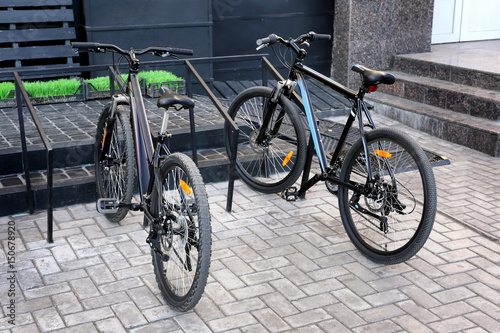 Bicycles in parking lots outdoors